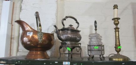 A brass table lamp, copper coal scuttle, plated spirit kettle and two bottle stand (one bottle a/f)