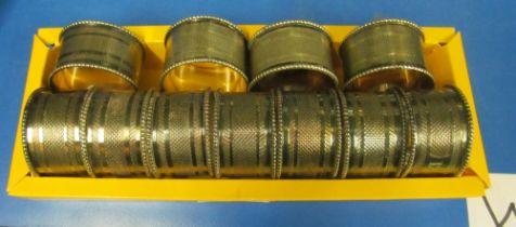 A set of twelve plated napkin rings