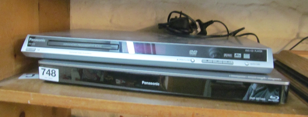 A Panasonic DVD and a Panasonic Blue Ray disc
