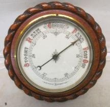 An oak barometer ropetwist rim