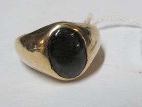 A gent's ring set grey stone marked 14k, 8.8g