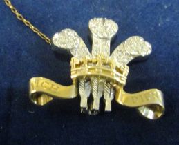 A 9ct gold diamond Fleur de Lys brooch