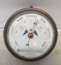 A Royal Navy barograph and a circular wall clock