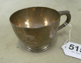 A heavy silver cup