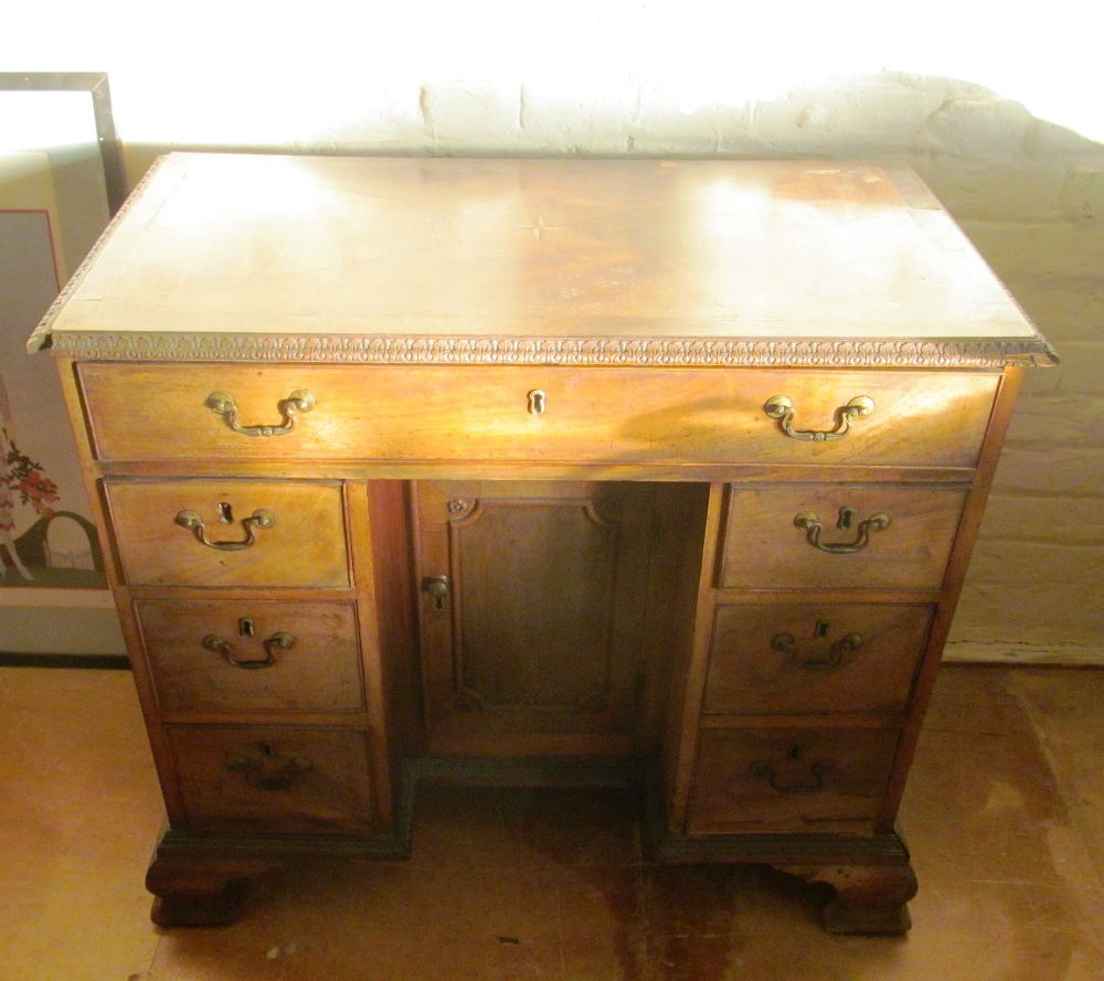 A Georgian mahogany kneehole desk
