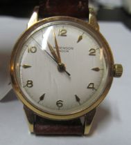 A J.W. Benson 9ct gold gent's watch on leather strap
