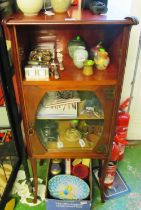 An Edwardian Art Nouveau cabinet on shaped legs