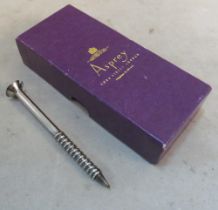 An pencil ballpen in the form of a screw i/c