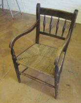 A Victorian ebonised bedroom chair with gilt mounts and a provincial armchair