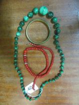 A malachite necklace and bracelet and coral necklace