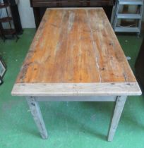 An oak kitchen table on square legs and elm ends and drawer