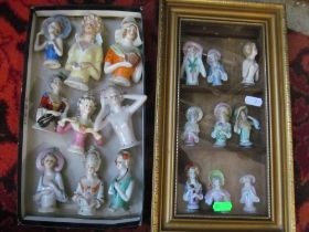 Nine crinoline ladies in display case and other crinoline ladies (no skirts)