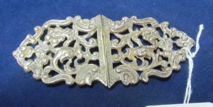 A silver nurse's buckle