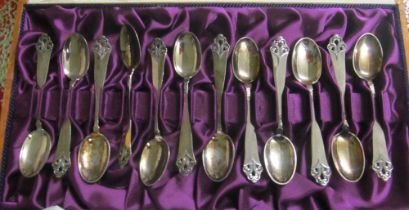 Twelve silver spoons (i.c)