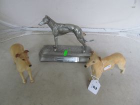 A Coral Brighton & Hove Greyhound Stadium Winners Trophy 2008 and two greyhound ornaments