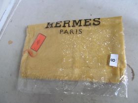 A Hermes silk and cashmere scarf yellow colour