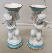 A pair Copeland candlesticks (one restored and other cracked)