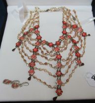 A Michael Vegin pretty costume necklace with flower beads in Saks Fifth Avenue box and a pair