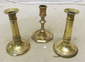 A Queen Anne style brass candlestick, pair George III brass candlesticks and jelly mould