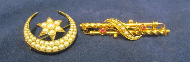 A seed pearl crescent brooch and a 15ct gold bar brooch set seed pearls and red stones