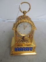 A gilt metal singing bird automaton clock