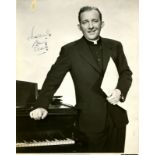 CROSBY BING: (1903-1977) American singer and actor,