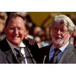 LUCAS GEORGE & LASSETER JOHN: George Lucas (1944- ) American film Director & John Lasseter (1957- )