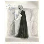 GRABLE BETTY: (1916-1973) American actress and pin-up girl. A good vintage signed and inscribed 8