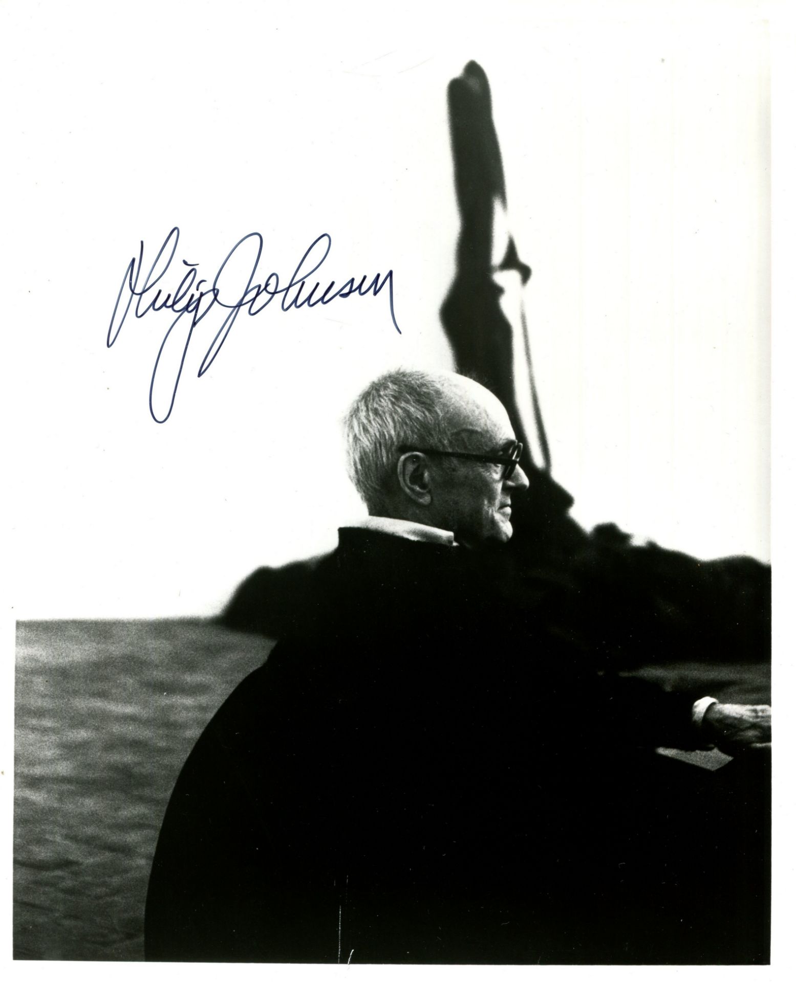 JOHNSON PHILIP: (1906-2005) American architect. Signed 8 x 10 photograph of Johnson seated in a