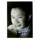 WOO JOHN: (1946- ) Hong Kong film director. Signed 8 x 10 photograph of Woo in a close-up head and