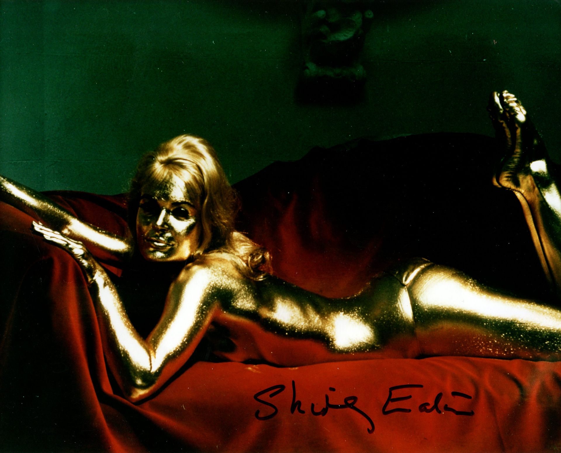 GOLDFINGER: Shirley Eaton (1937- ) English actress. Signed colour 10 x 8 photograph of Eaton lying