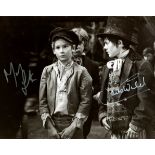 OLIVER!: Signed 10 x 8 photograph by both Mark Lester (Oliver Twist) and Jack Wild (Artful Dodger)