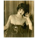 BOW CLARA: (1905-1965) American actress. Vintage signed and inscribed 10 x 12 photograph of The It