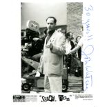 SERIAL MOM: John Waters (1946- ) American film director. Signed 8 x 10 photograph of Waters standing