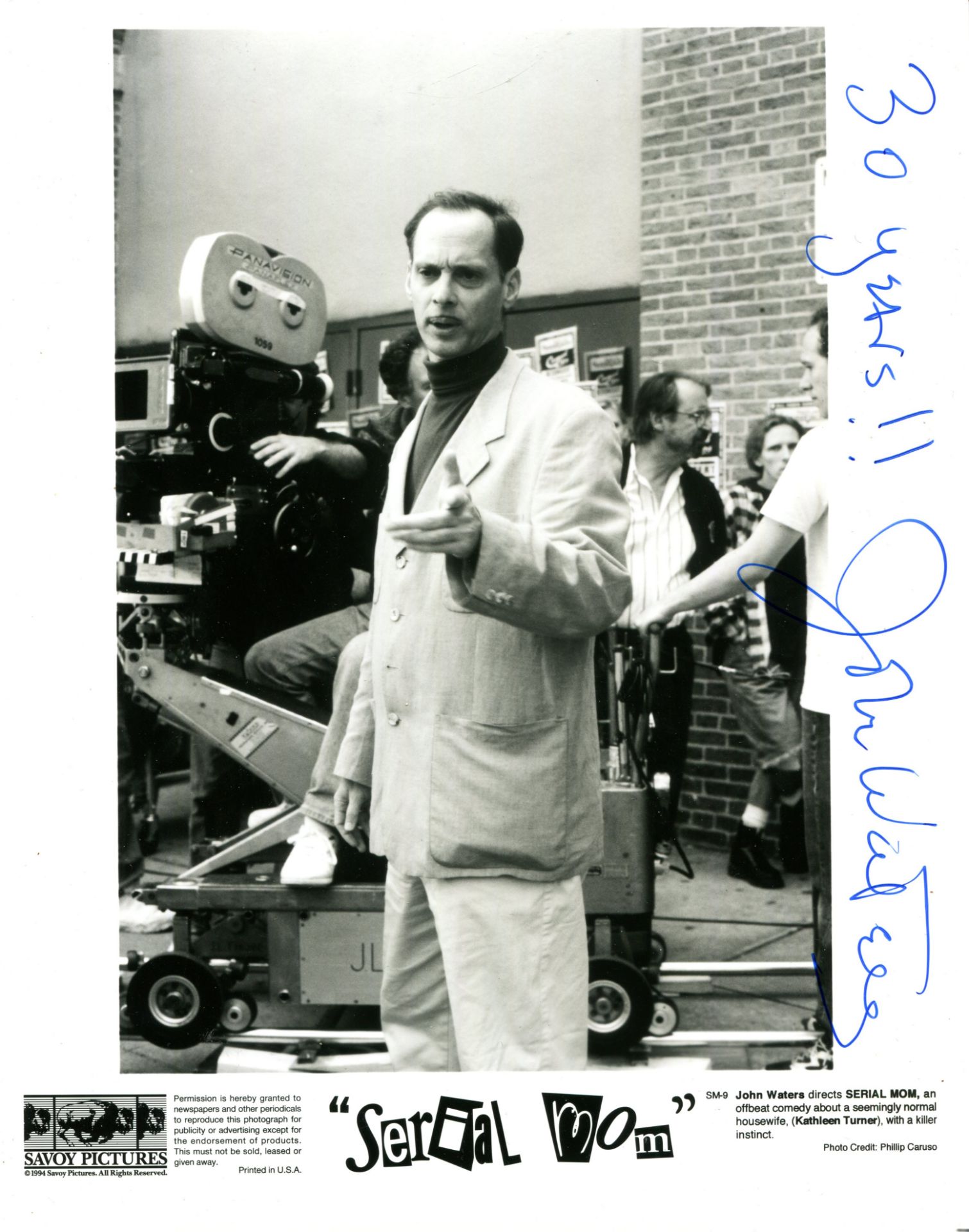 SERIAL MOM: John Waters (1946- ) American film director. Signed 8 x 10 photograph of Waters standing