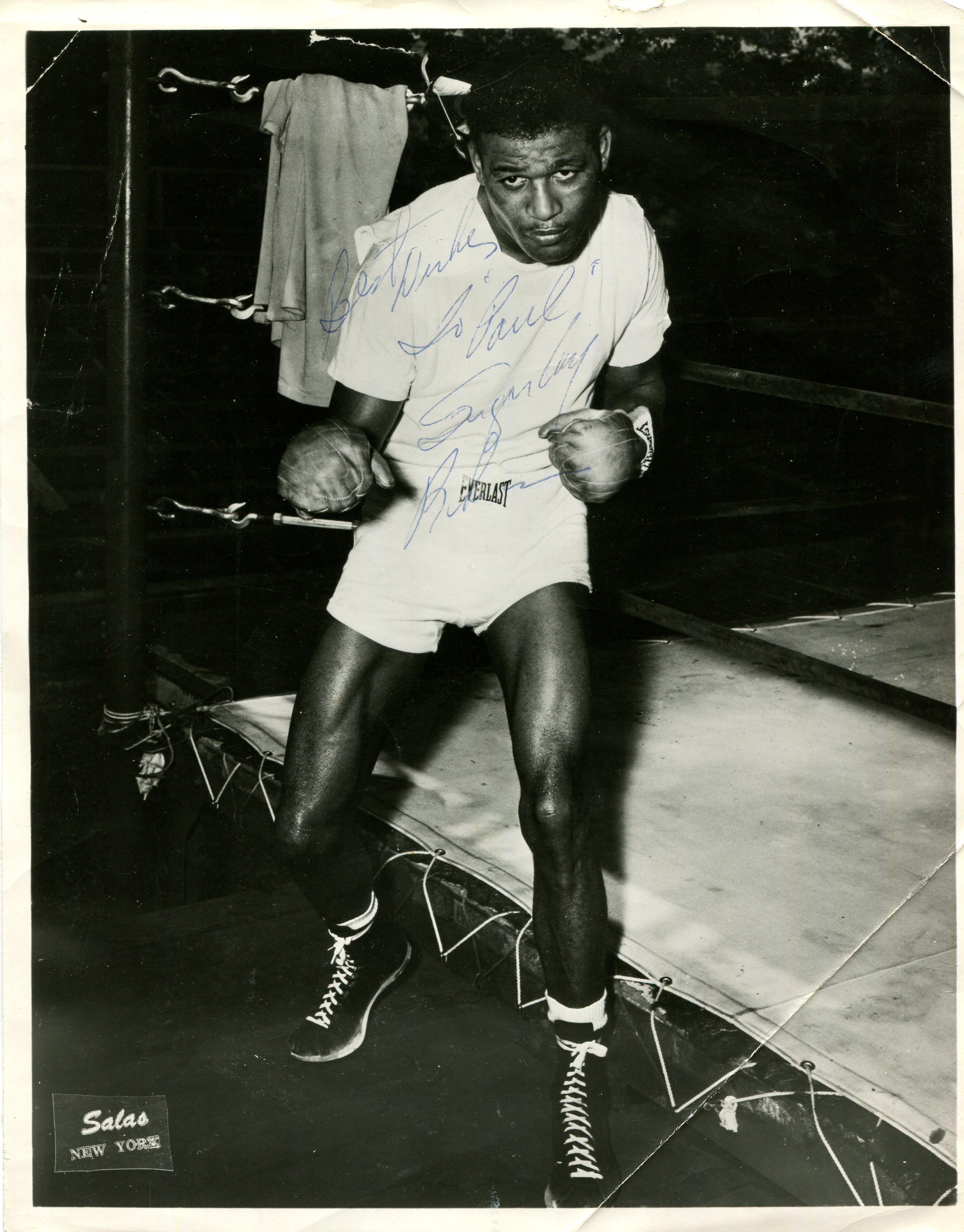 ROBINSON SUGAR RAY: (1921-1989) American boxer, World Welterweight Champion 1946-50, World