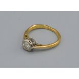 An 18ct gold solitaire diamond ring, 2.6 grams, ring size I