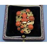 A 19th Century yellow metal and coral set brooch with central coral bust depicting Napoleon, 8.6