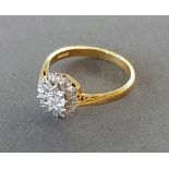 An 18ct gold diamond cluster ring, 3.4gms