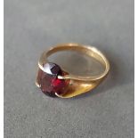 A 9ct gold ring set single Garnet, 2.8gms