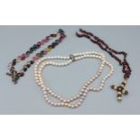 A cultured pearl double row pearl necklace together with two bead necklaces