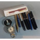Four fountain pens by Osmiroid together with other pens and a brass compass