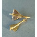 A 9ct gold pendant in the form of Concorde together with a matching brooch, 4.6gms