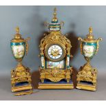 A French spelter and porcelain mounted three piece clock garniture, the clock with two train