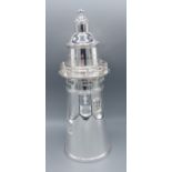 A silver plated cocktail shaker in the form of a lighthouse, 34cms tall