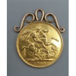 An Edwardian full gold Sovereign dated 1908 with gold pendant mount