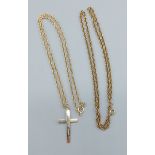 A 9ct gold crucifix pendant together with two 9ct gold chains, 12.1 grams