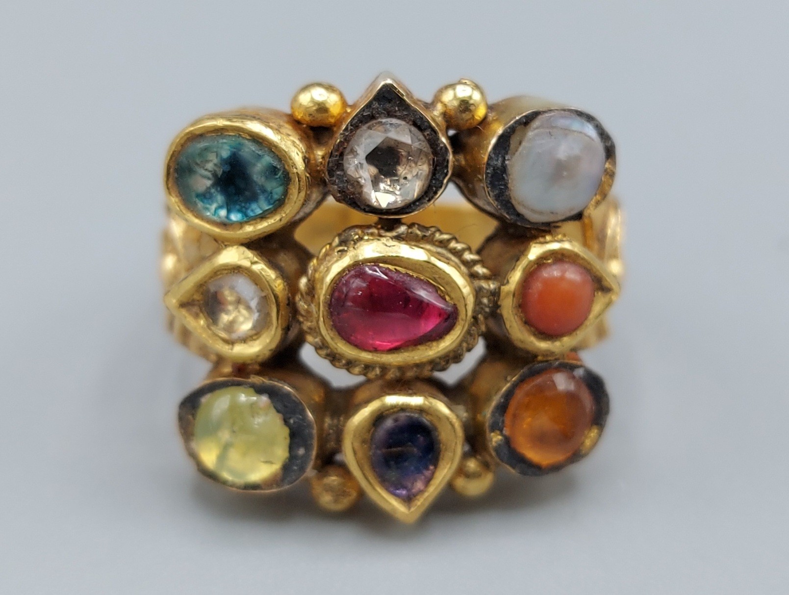 A Mughal yellow metal ring set with a single diamond and semi-precious stones, 10gms, - Image 2 of 2