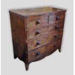 A 19th Century mahogany straight front chest with two short and three long drawers raised upon