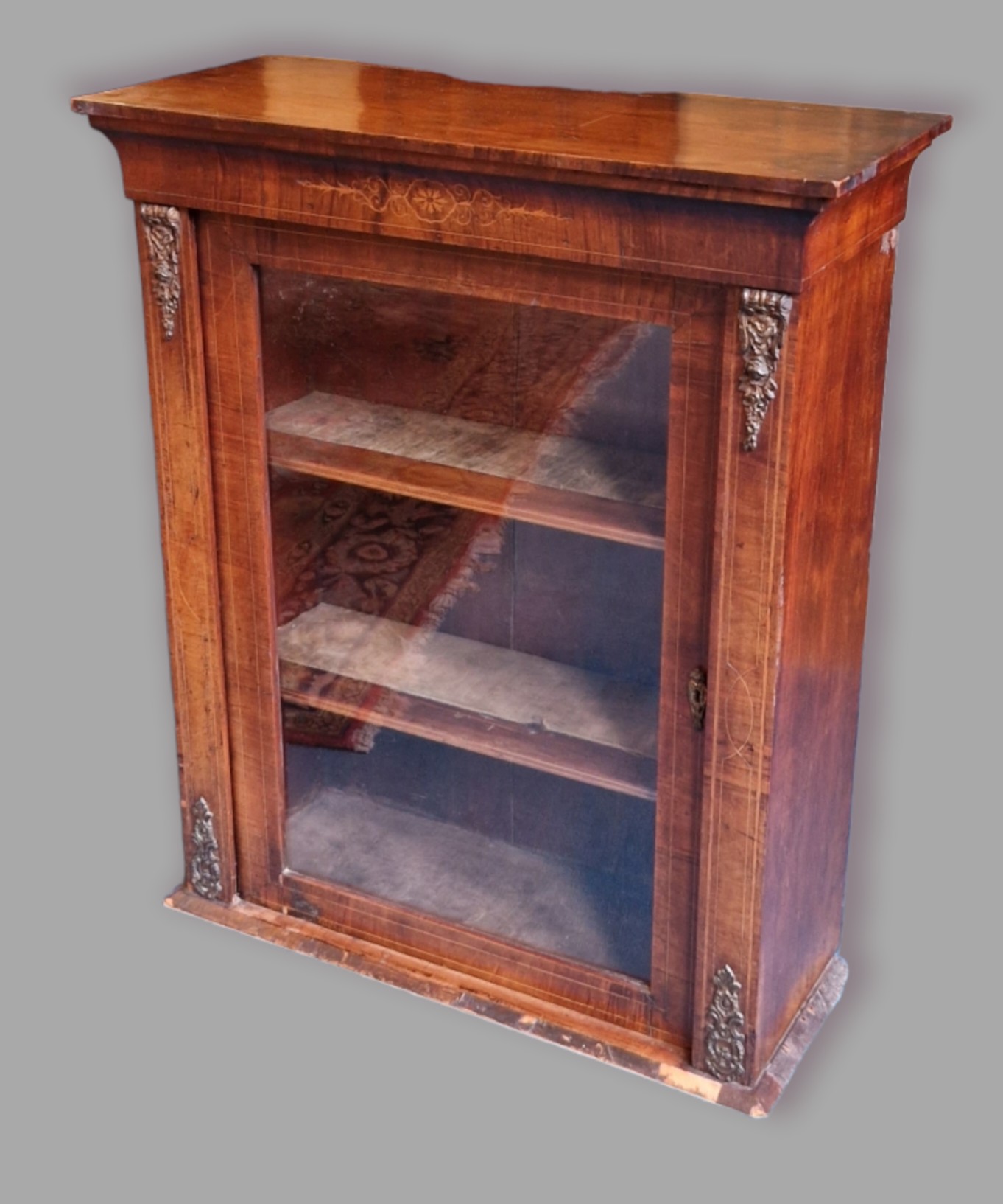 A Victorian walnut marquetry inlaid and gilt metal mounted pier cabinet, 76cms wide, 32cms deep